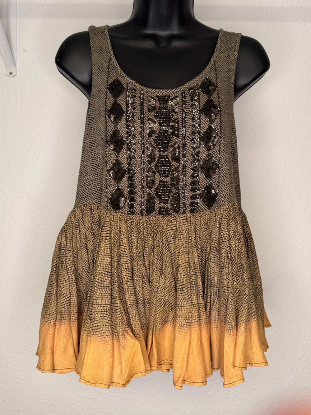 Akamai + Kim from Anthropologie Women’s Beaded Sleeveless Peplum Top
